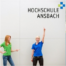 Banner von StudyCheck: Mit der Hochschule Ansbach im Hintergrund